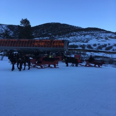 horses pulling sleigh in snow Park City